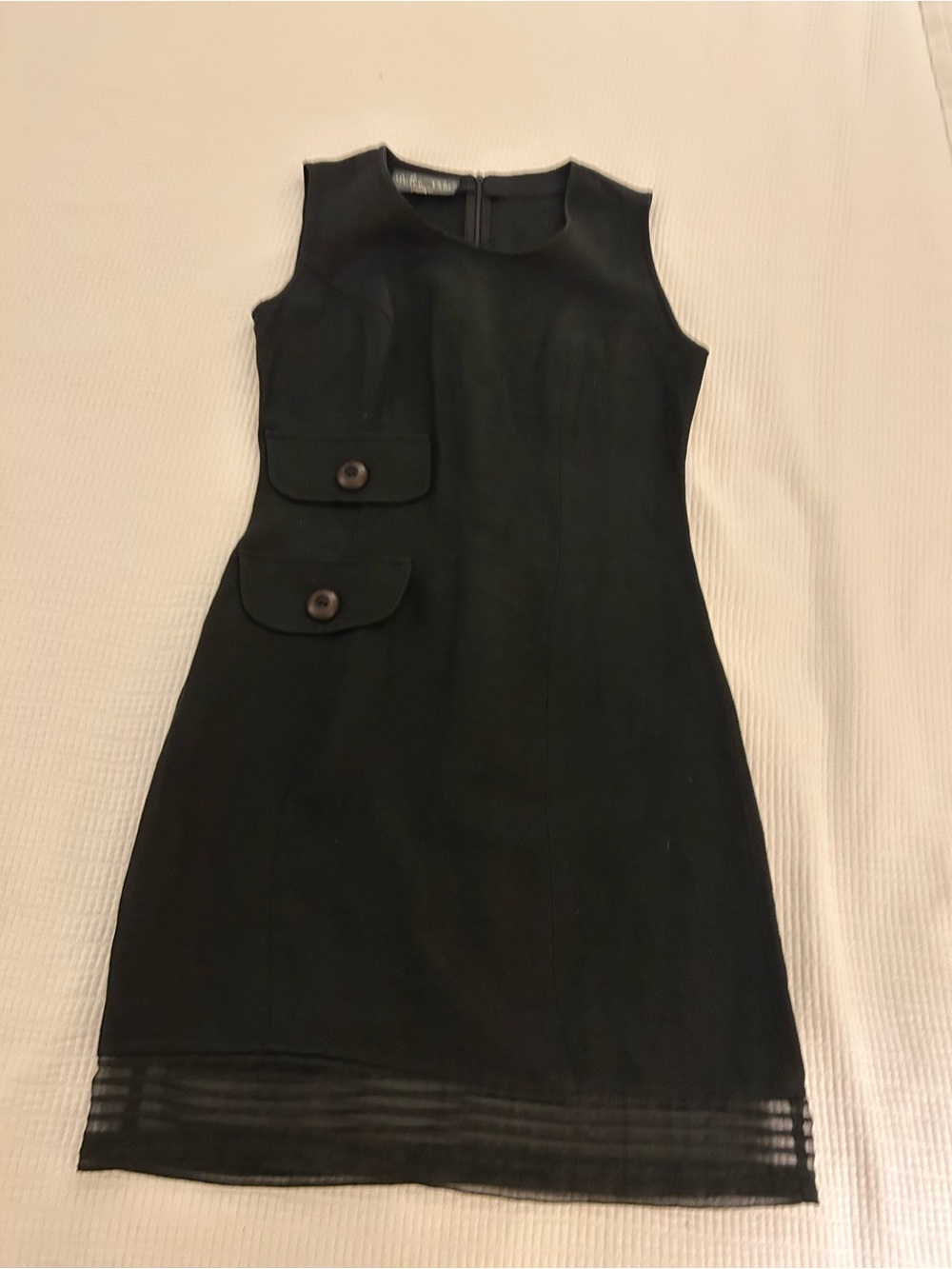 Dolce Vita Black Sleeveless Shift Dress with Button Flap Pockets and Sheer Hem